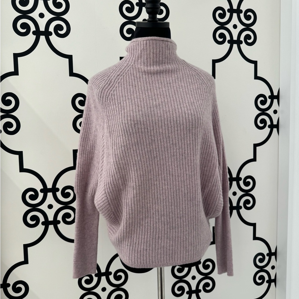 Gray cashmere turtle neck sweater.